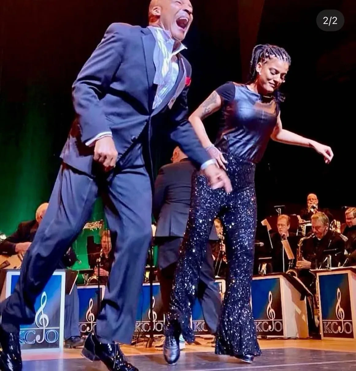 Chloe McFadden tap dancing on stage with the KCJO