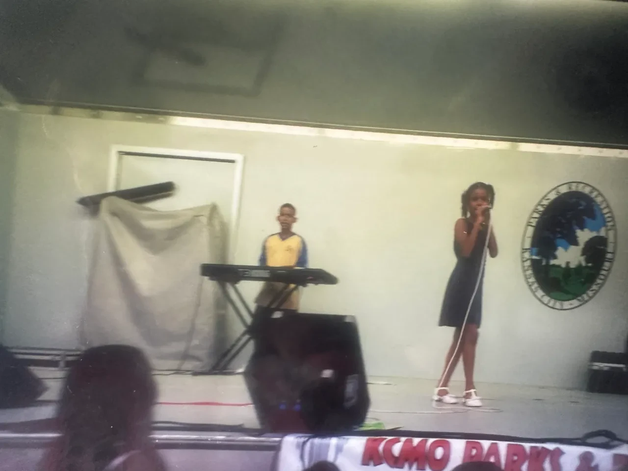 Young Chloe McFadden performing on the KCMO Parks & Recreation stage